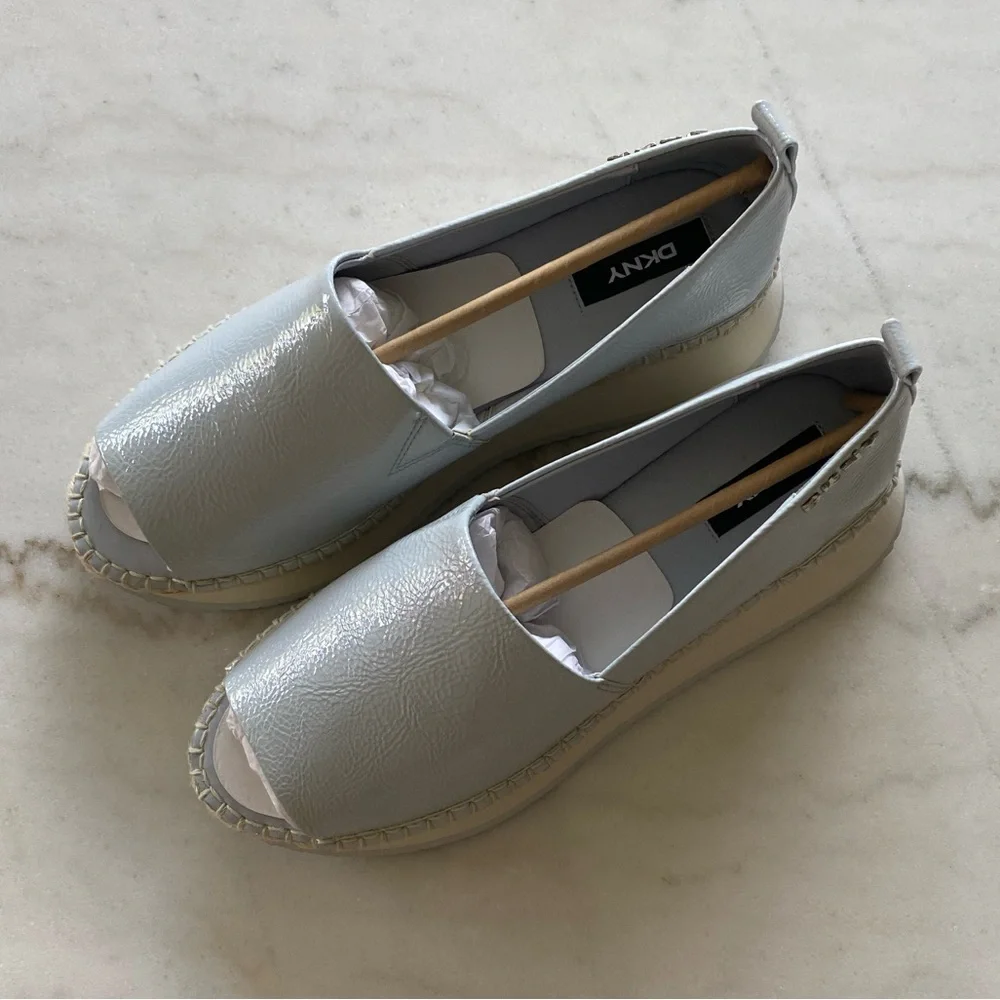 DKNY Women's Orza faux leather slip-on Shoes blue halogen size 9.5.